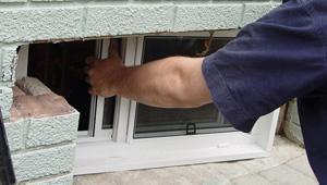 Installing new windows in a Somerville finished basement