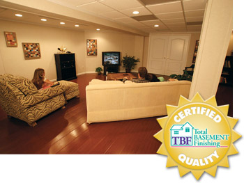 A remodeled basement with the Total Basement Finishing™ badge in Massachusetts & New Hampshire