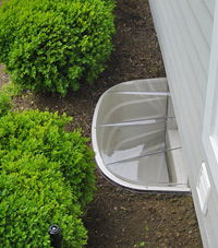 basement egress window well in Derry